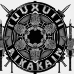 The image features a stylized emblem with a circular design, showcasing a group of armored individuals holding spears and a shield in the center. The word \"KYUSAN\" is prominently displayed at the bottom, and the emblem is adorned with intricate patterns and symbols.